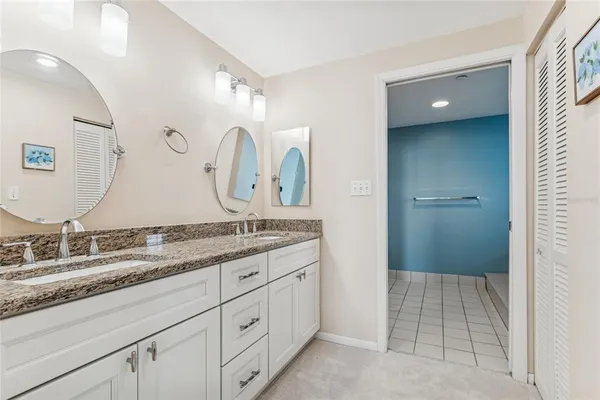 a bathroom with a bathtub and toilet