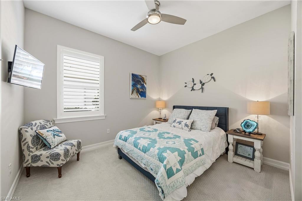14748 Windward Lane Naples, FL 34114 - Photo 18 of 47 a bedroom with bed and a window