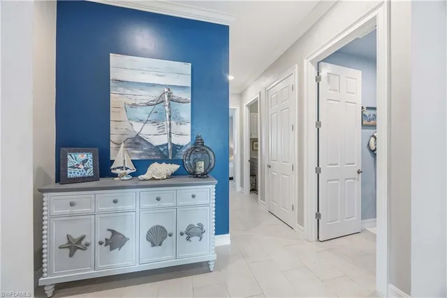a view of kitchen with wooden cabinet
