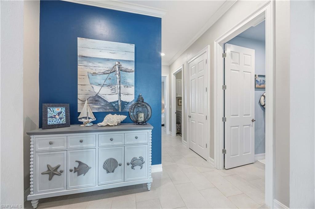 14748 Windward Lane Naples, FL 34114 - Photo 22 of 47 a view of kitchen with wooden cabinet