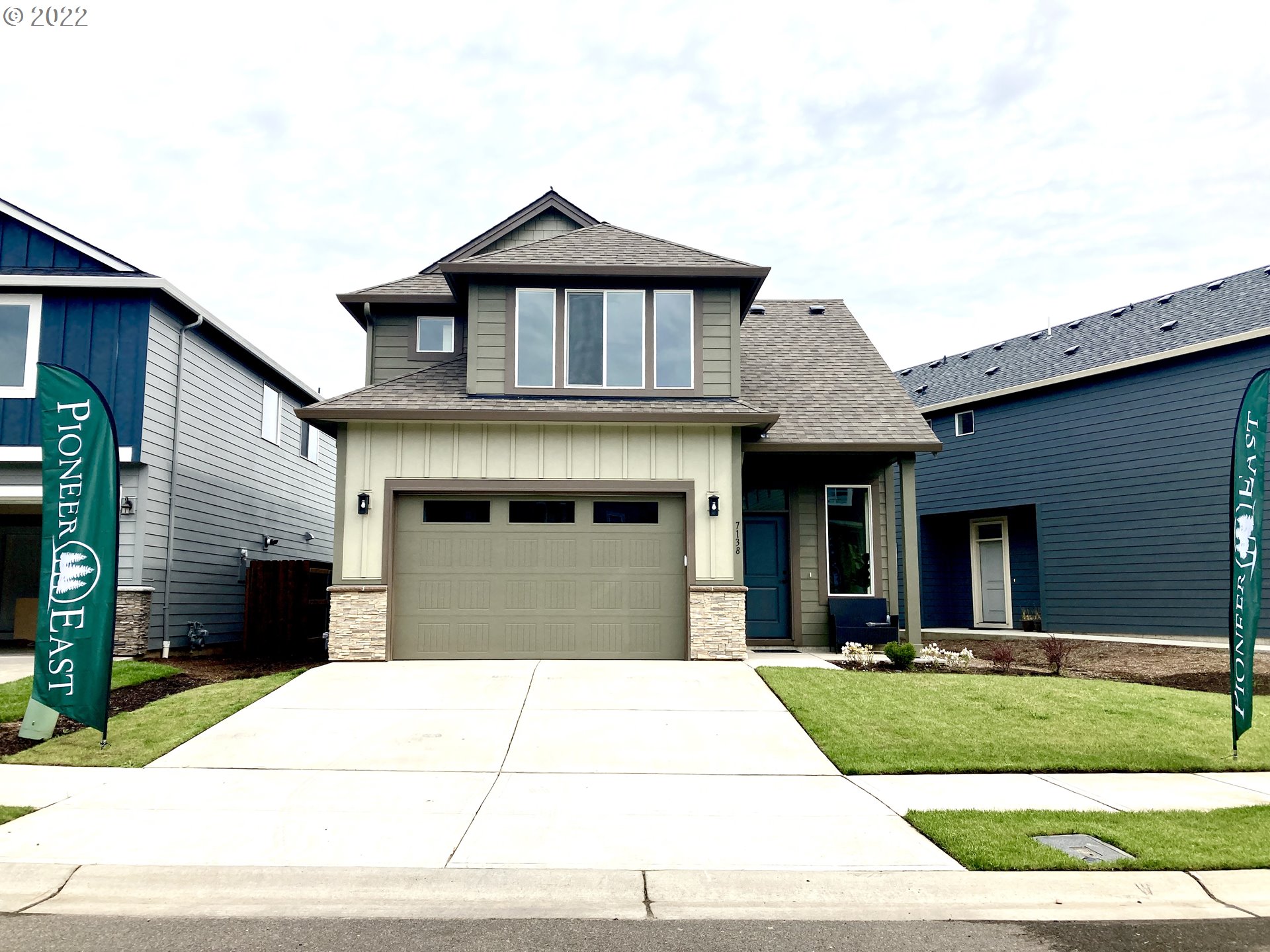 7138 South 11th Street Ridgefield, WA 98642 - Photo 1 of 14 a front view of a house with yard
