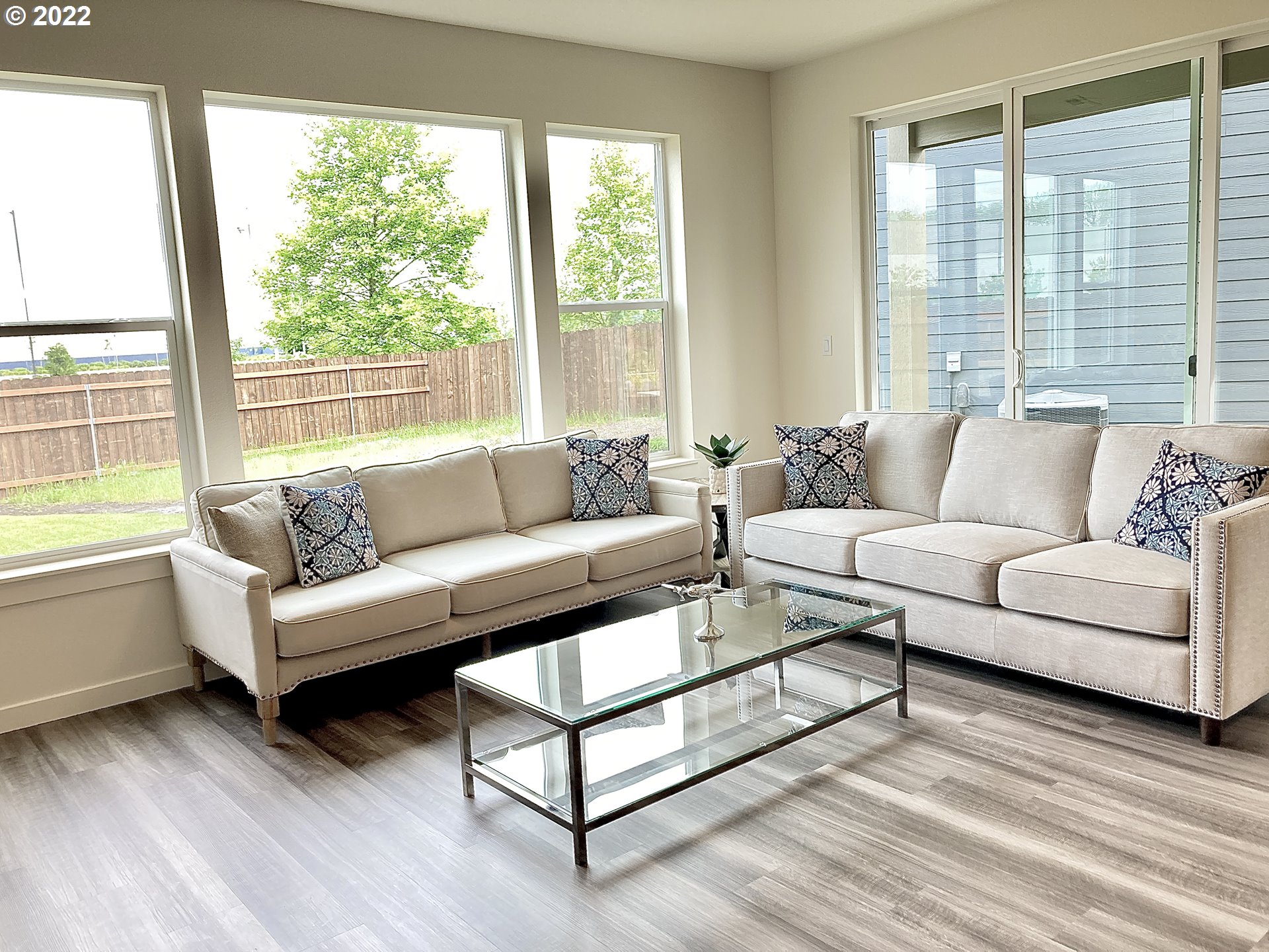 7138 South 11th Street Ridgefield, WA 98642 - Photo 2 of 14 a living room with furniture and a large window