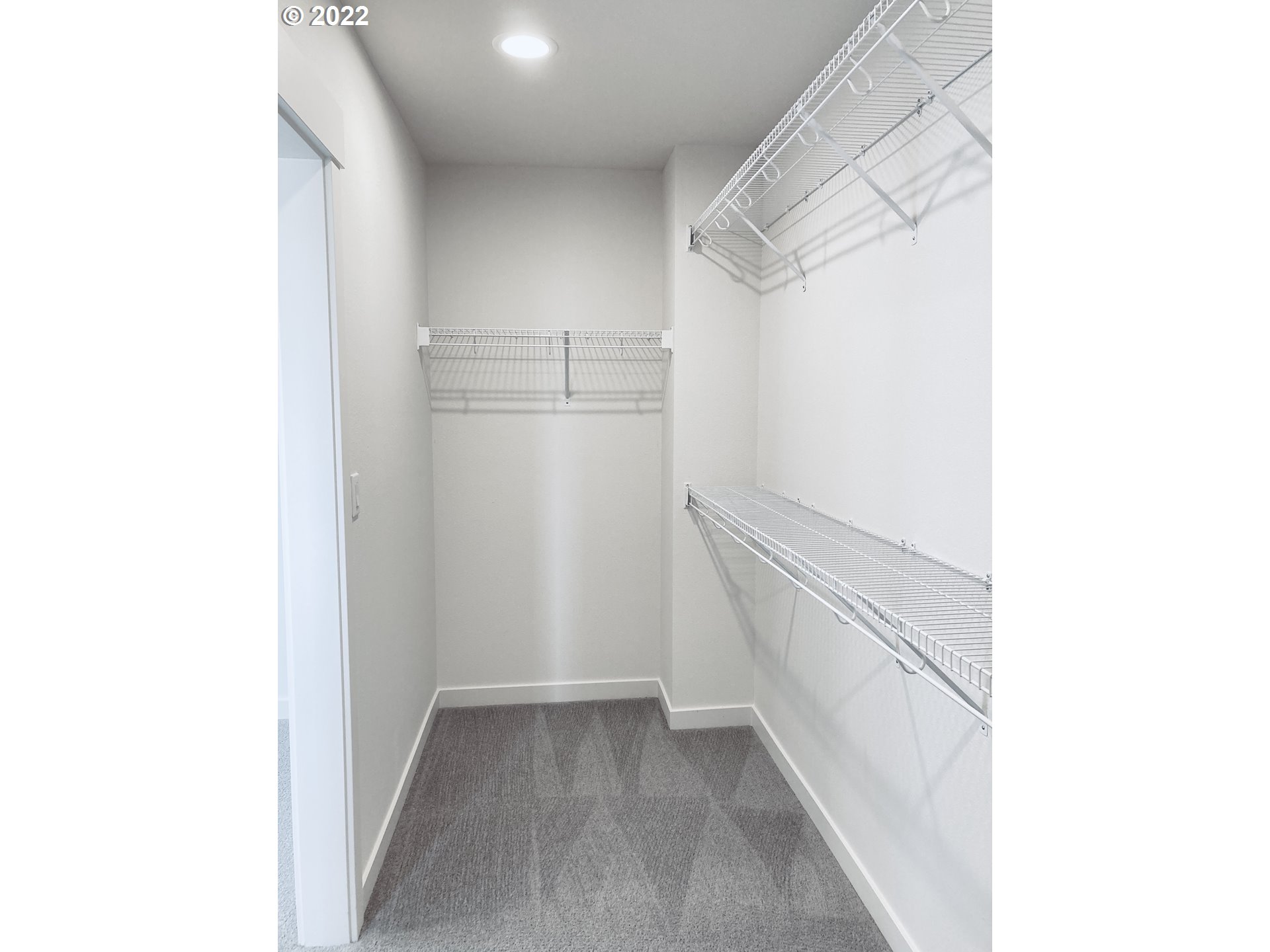 7138 South 11th Street Ridgefield, WA 98642 - Photo 10 of 14 a view of walk in closet with empty racks