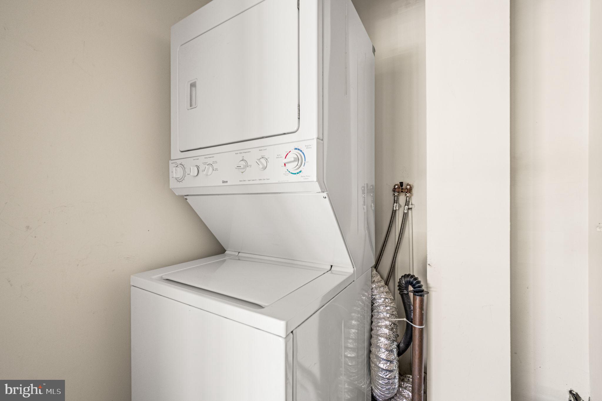 801 Yale Avenue, Unit 511 Swarthmore, PA 19081 - Photo 13 of 28 Laundry closet with room for some storage.