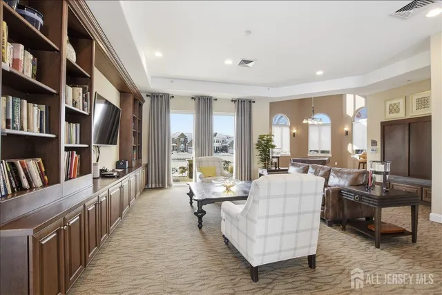 a bedroom with a bed and a table