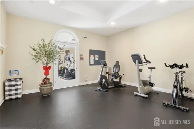 a bathroom with a toilet a sink and a mirror