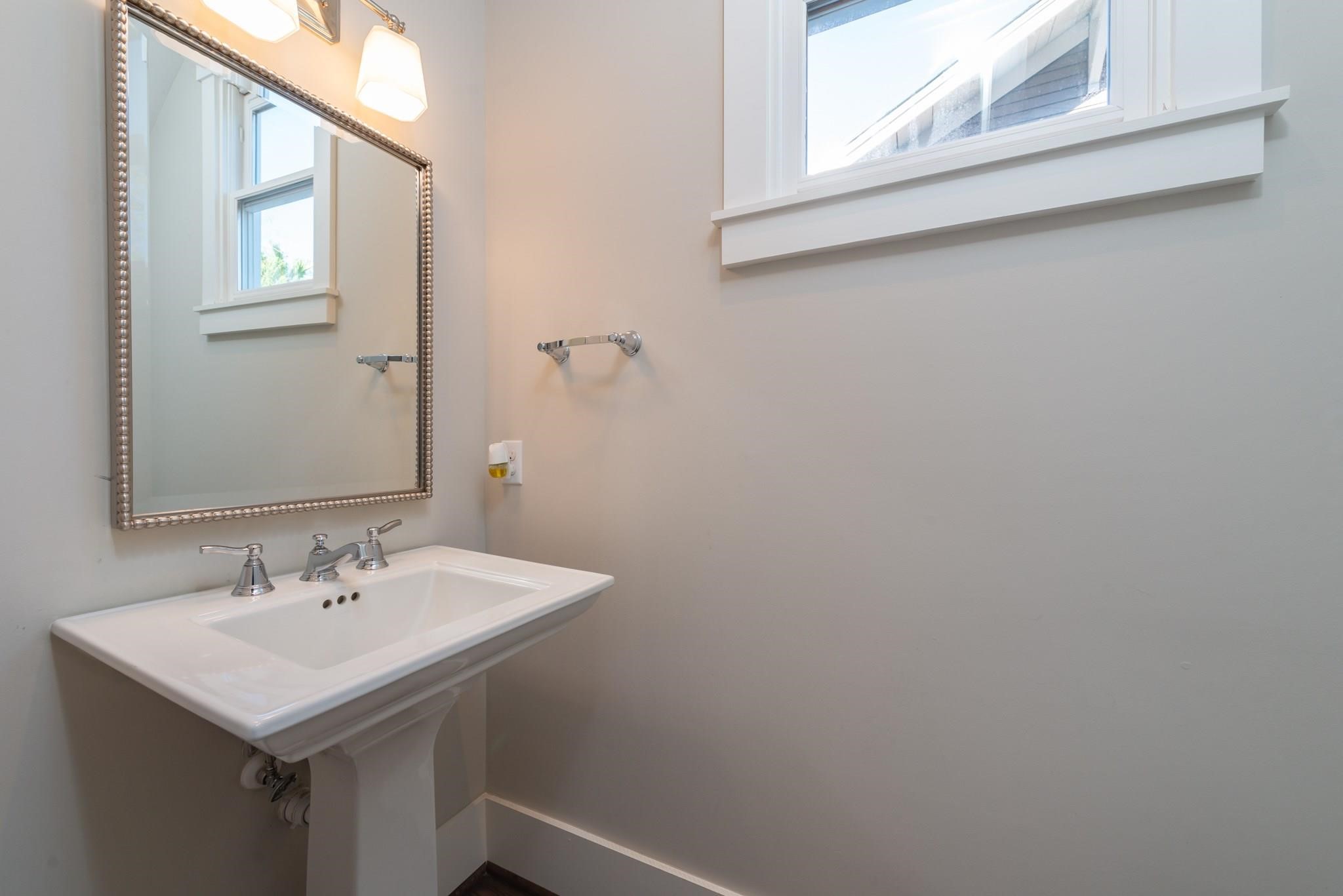 734 Allston Street, Unit B Houston, TX 77007 - Photo 12 of 28 Downstairs half bath.