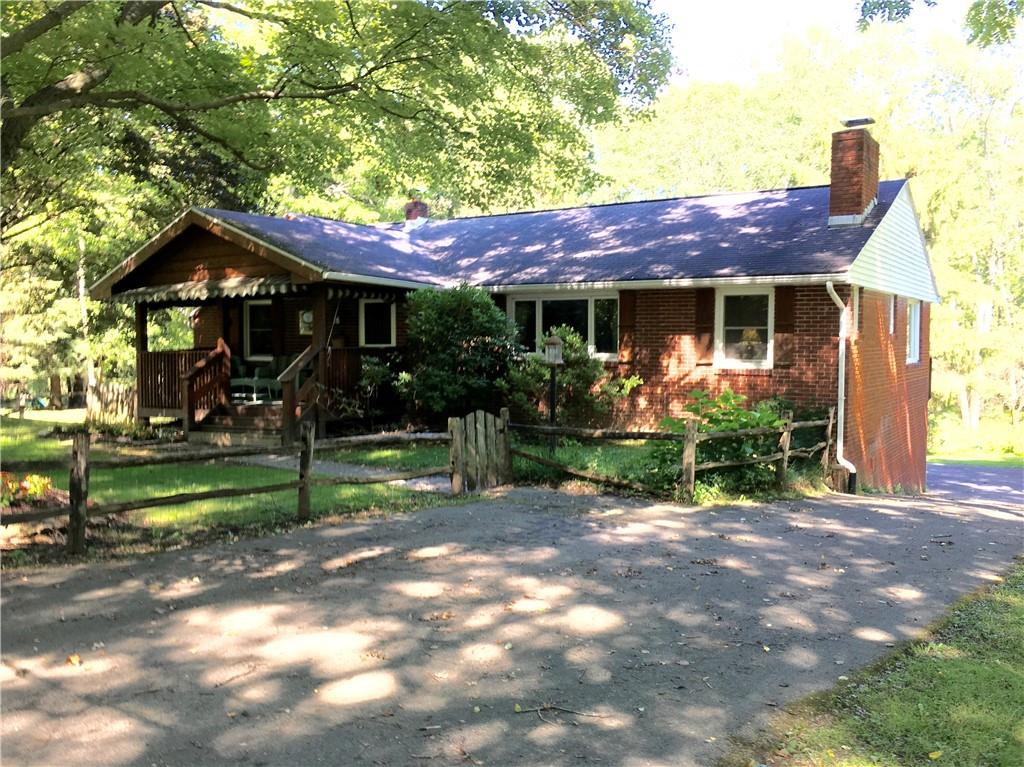582 Weaver Mill Road Rector, PA 15677 - Photo 1 of 25 A wonderful brick Ranch in Rector! Wood Burning Fireplace. Paved Driveway. (2) Car Garage. Fenced in front yard. Covered Front Porch with Awnings.