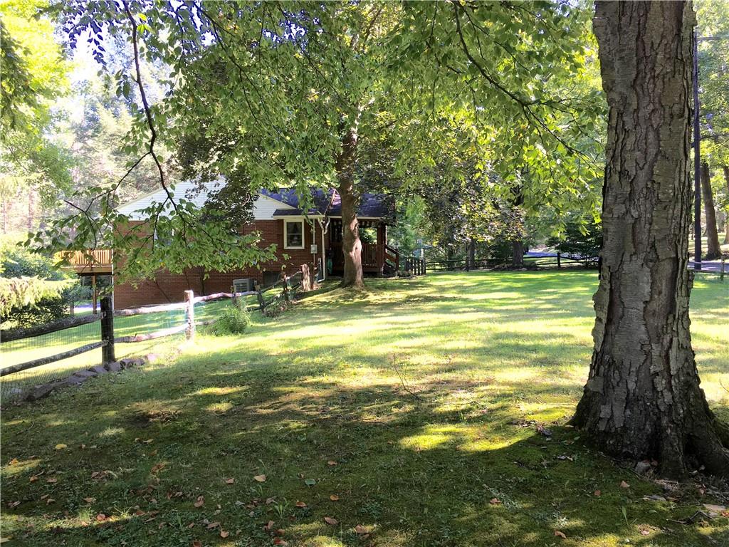 582 Weaver Mill Road Rector, PA 15677 - Photo 2 of 25 The front yard is huge and fenced in. It is also flat and has plenty of shade!