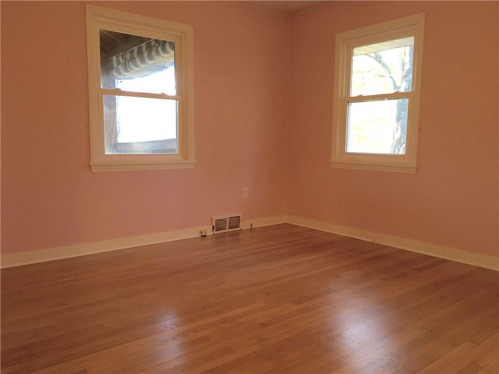 582 Weaver Mill Road Rector, PA 15677 - Photo 19 of 25 A view into the front Bedroom. This nice sized 11x12 Bedroom features a huge closet behind and left of the photographer with double interior doors allowing easy access to it full breadth. Two windows allow natural light to flow in.