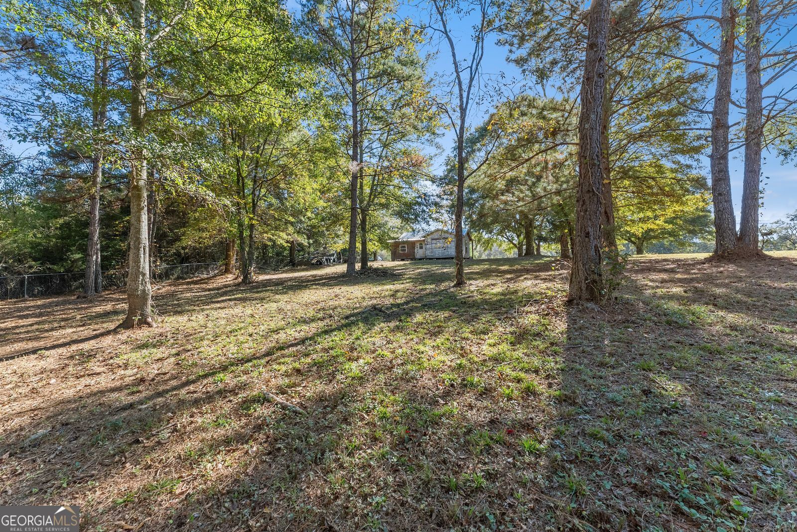 5830 Maysville Road Commerce, GA 30529 - Photo 12 of 12 a backyard of a house with lots of green space