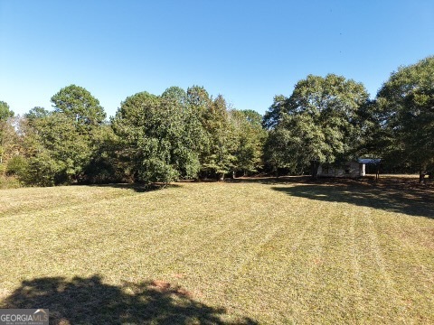 5830 Maysville Road Commerce, GA 30529 - Photo 2 of 12 a view of swimming pool with an outdoor space