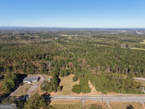 5830 Maysville Road Commerce, GA 30529 - Photo 4 of 12 an aerial view of residential houses with outdoor space
