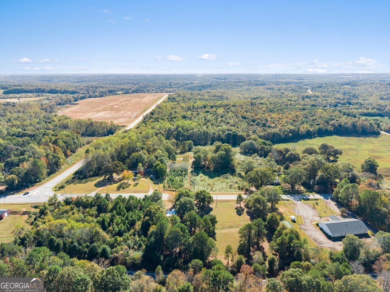 5830 Maysville Road Commerce, GA 30529 - Photo 8 of 12 an aerial view of residential building and lake