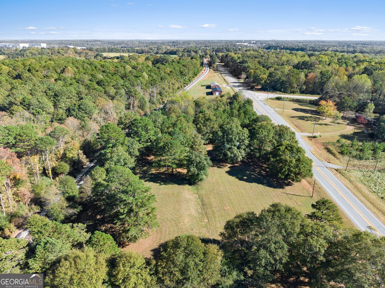 5830 Maysville Road Commerce, GA 30529 - Photo 10 of 12 a view of a garden with a pathway