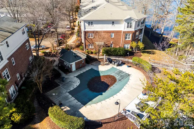 a view of a swimming pool with a patio