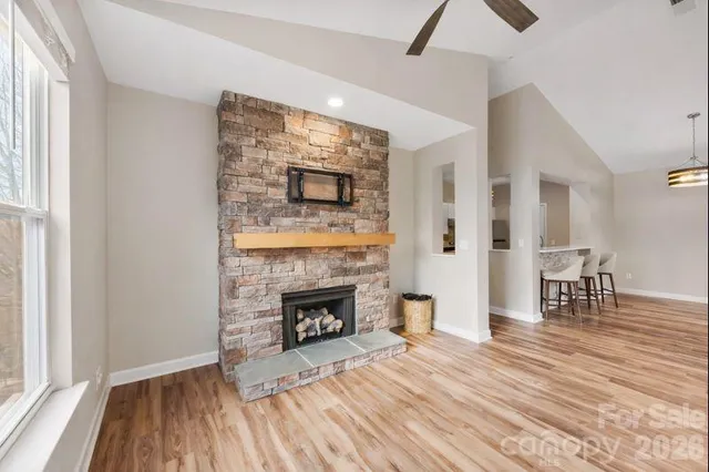 a room with furniture and a fireplace