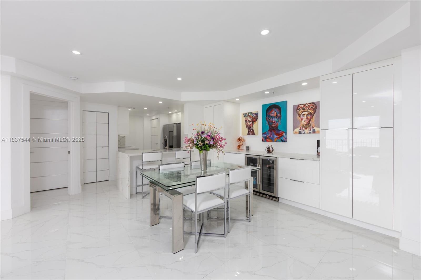 701 Brickell Key Boulevard, Unit 2011 Miami, FL 33131 - Photo 2 of 24 a view of a dining room with furniture