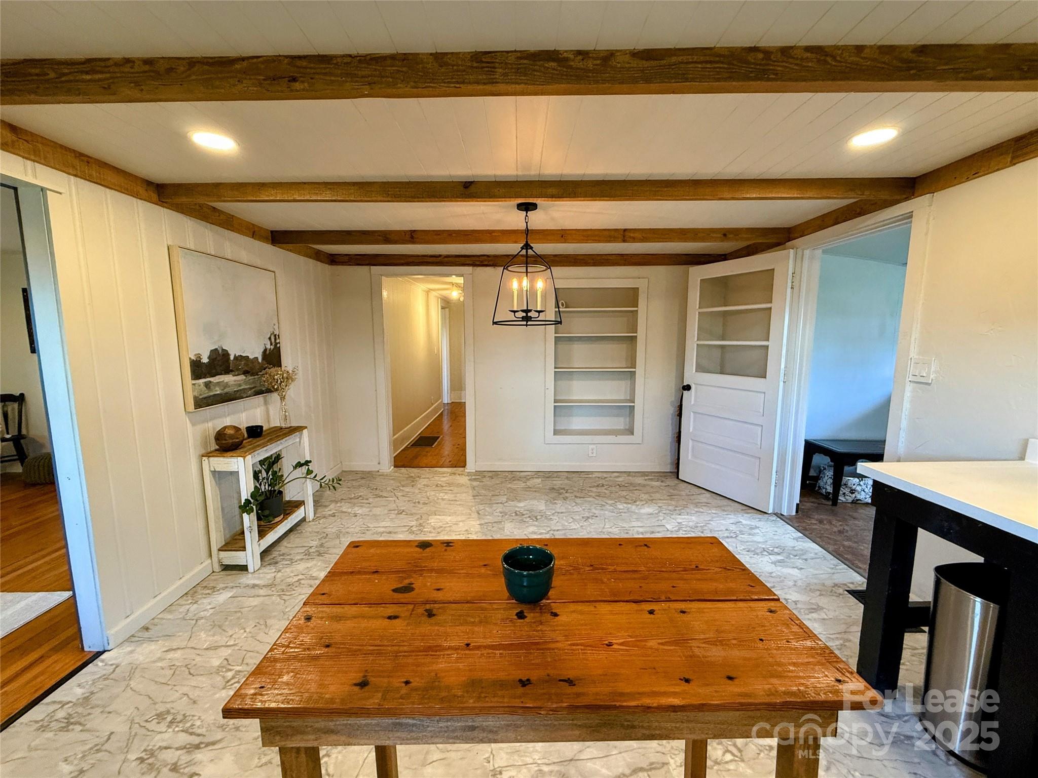 7135 Nc Highway Mill Spring, NC 28756 - Photo 12 of 28 a room with pool table and two mirrors