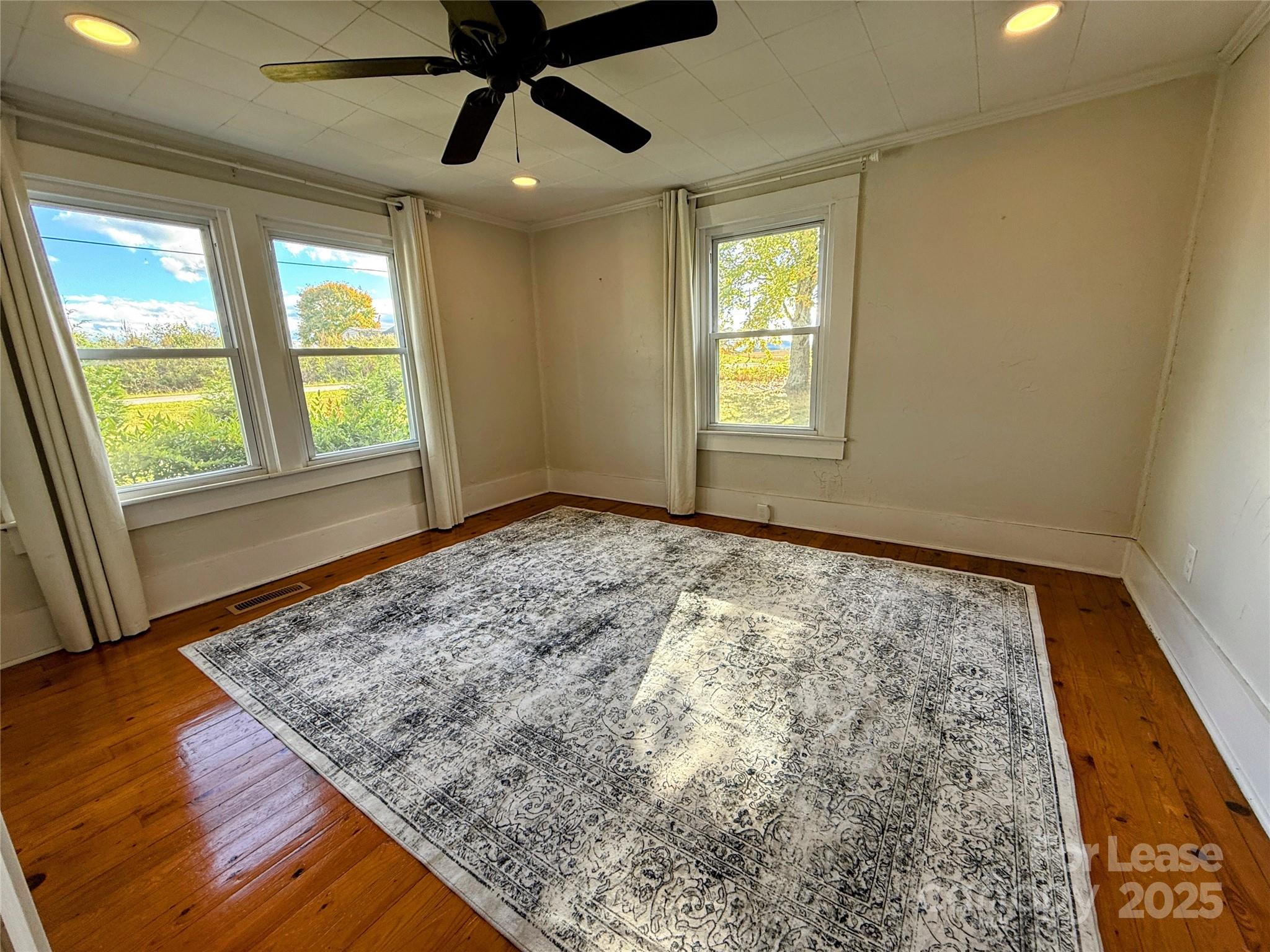 7135 Nc Highway Mill Spring, NC 28756 - Photo 20 of 28 a view of an empty room and window