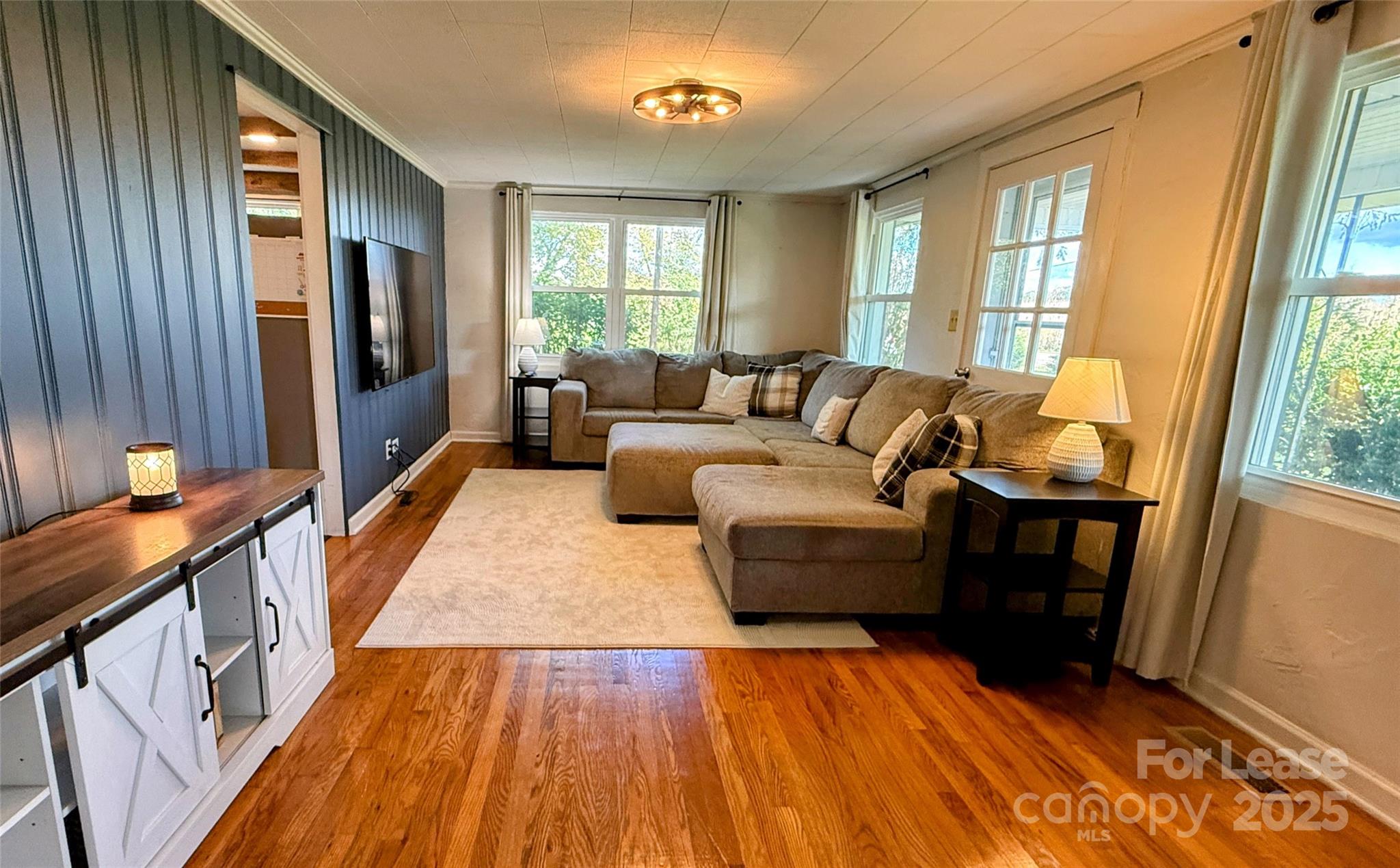 7135 Nc Highway Mill Spring, NC 28756 - Photo 8 of 28 a living room with furniture and a window