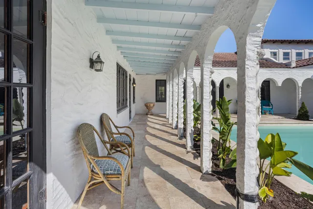 a view of living room kitchen and entryway