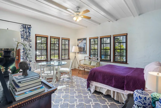 a living room with furniture fireplace and flat screen tv
