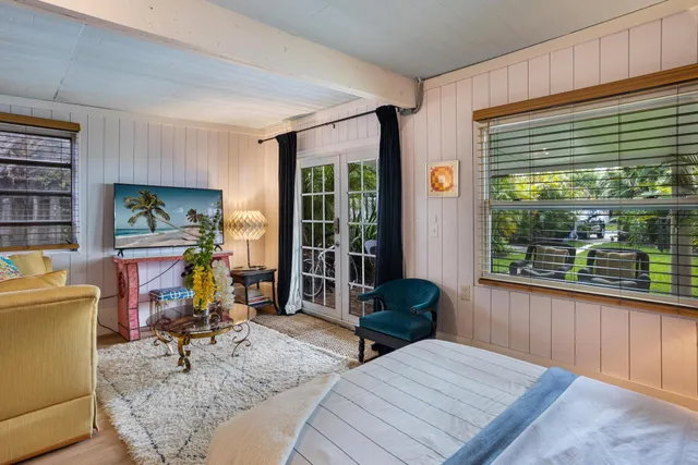a view of a livingroom with furniture window and outside view
