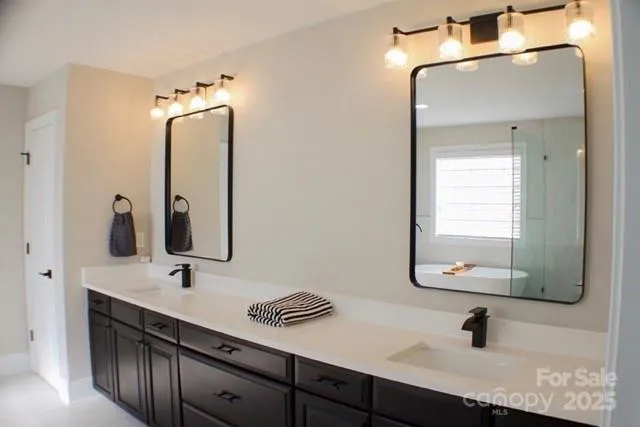 a bathroom with a tub and shower
