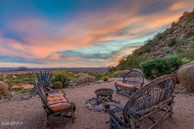 a view of a patio with furniture
