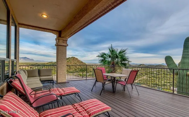 a view of a road with mountains in the background