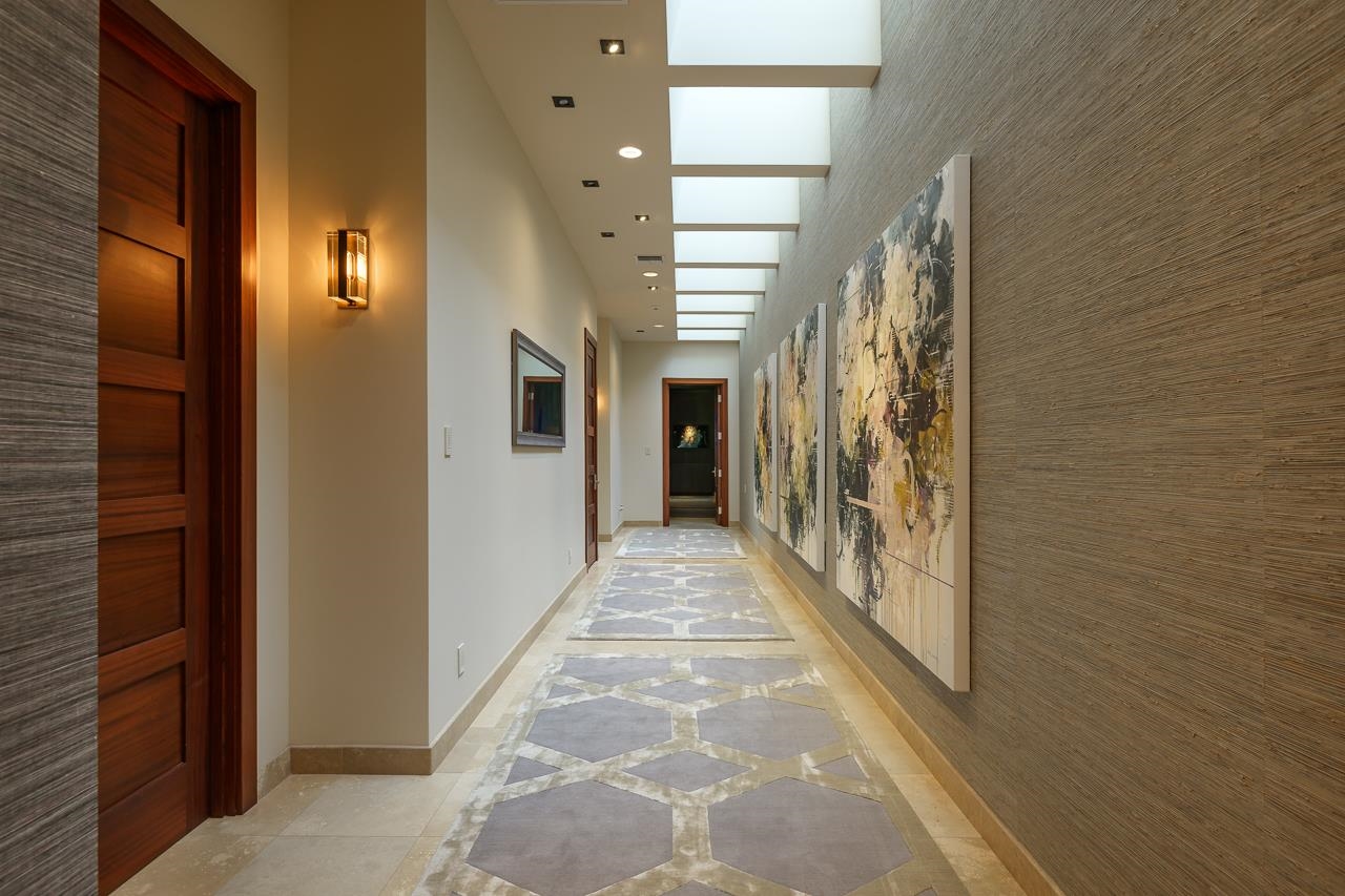 4809 Lower Honoapiilani Road Lahaina, HI 96761 - Photo 33 of 49 a view of a hallway with wooden shelves