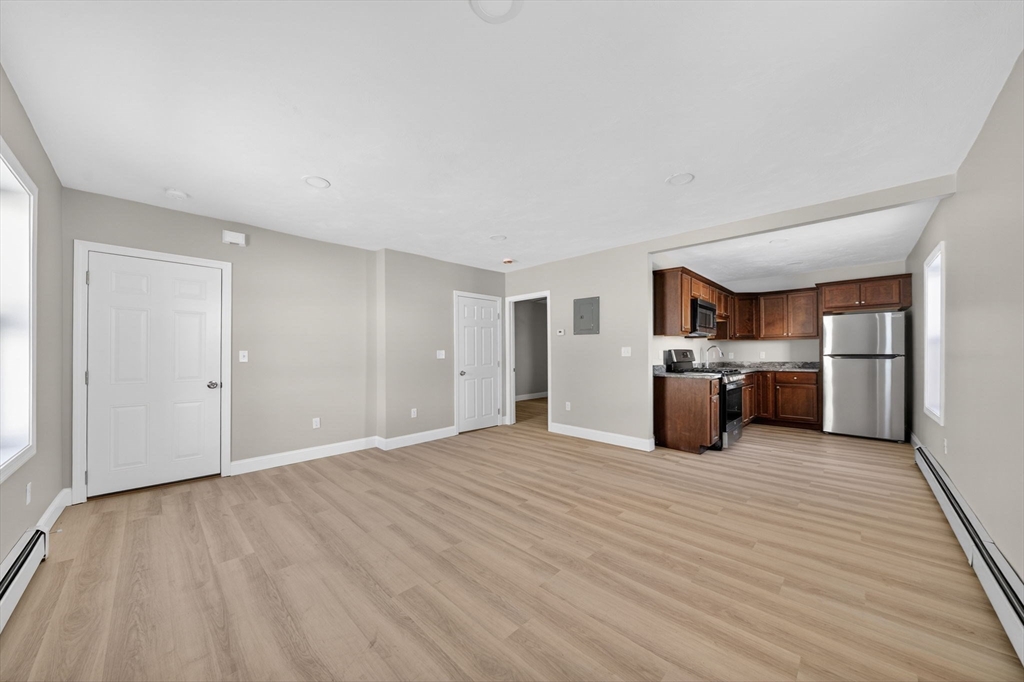 169 Grant Street Fall River, MA 02721 - Photo 15 of 42 a view of a kitchen with a sink cabinets and a kitchen