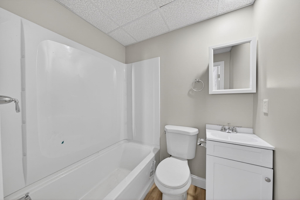 169 Grant Street Fall River, MA 02721 - Photo 22 of 42 a bathroom with a toilet a sink and bathtub