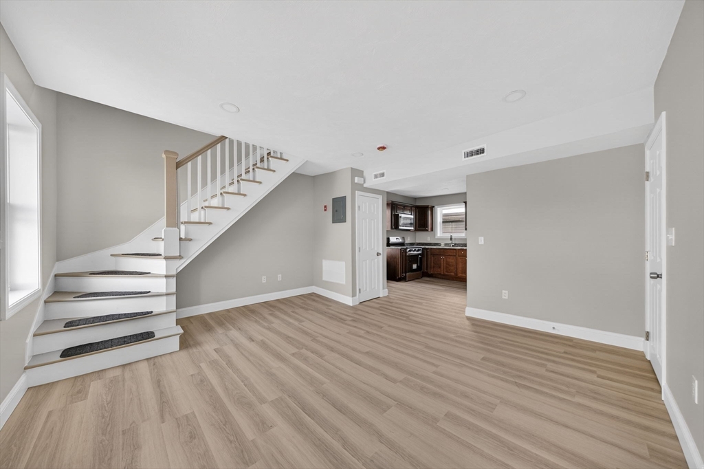 169 Grant Street Fall River, MA 02721 - Photo 23 of 42 a view of entryway and hall with wooden floor