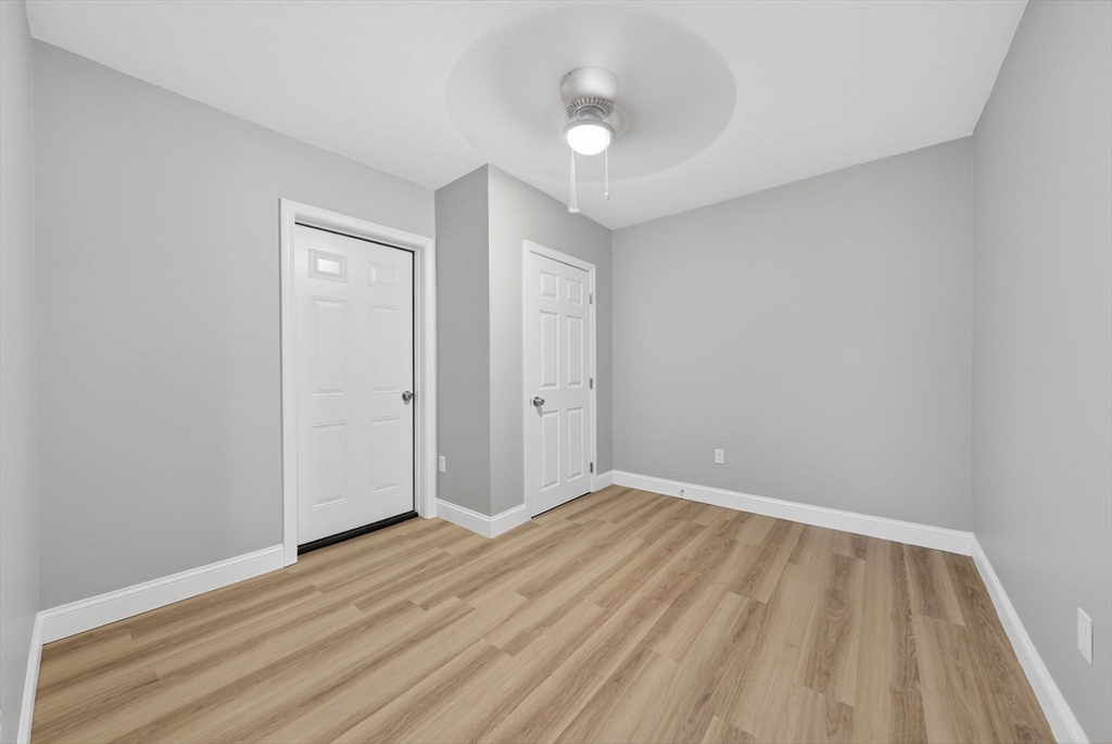 169 Grant Street Fall River, MA 02721 - Photo 28 of 42 wooden floor in an empty room