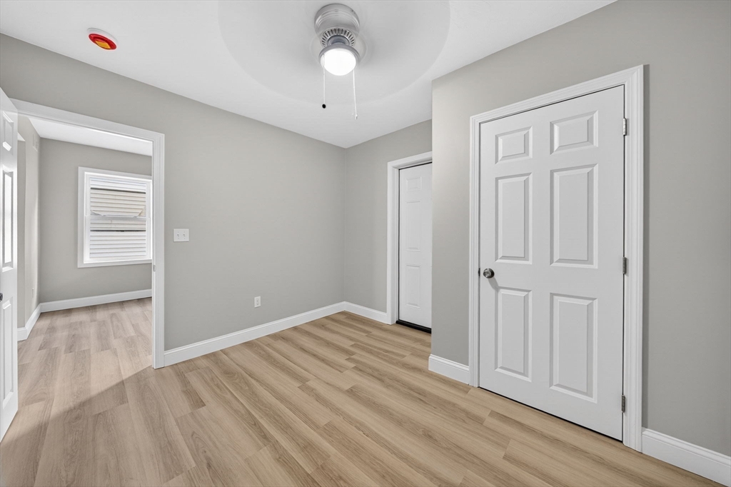 169 Grant Street Fall River, MA 02721 - Photo 29 of 42 wooden floor in an empty room