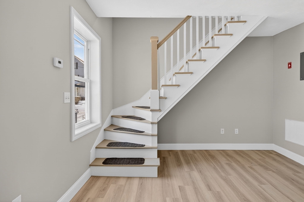 169 Grant Street Fall River, MA 02721 - Photo 31 of 42 a view of entryway and hall with wooden floor