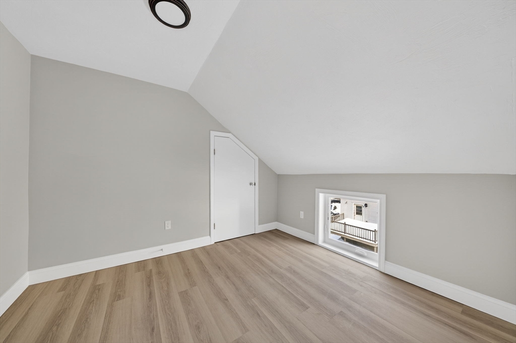 169 Grant Street Fall River, MA 02721 - Photo 32 of 42 a view of empty room with wooden floor and fan