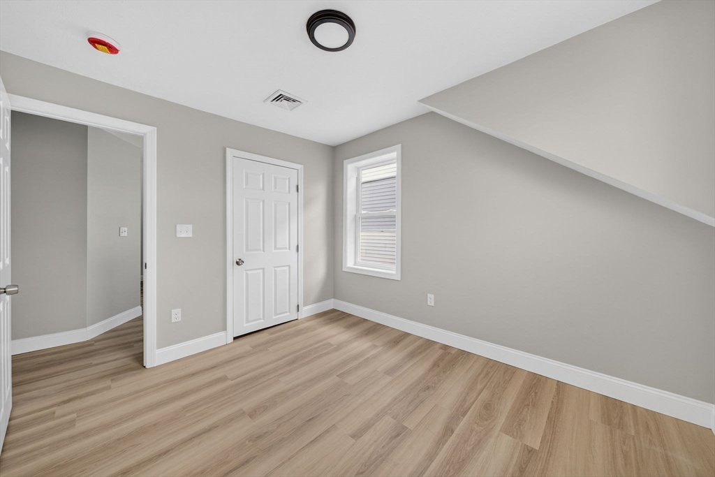 169 Grant Street Fall River, MA 02721 - Photo 35 of 42 wooden floor in an empty room