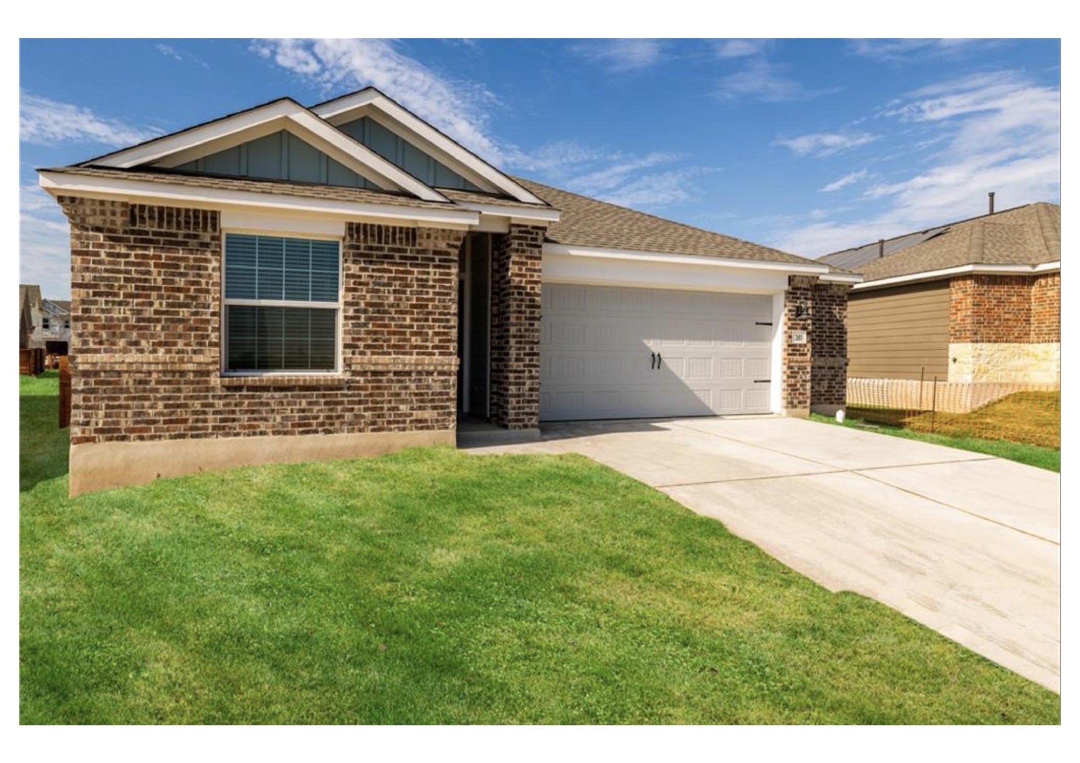 381 Jack Ryan Kyle, TX 78640 - Photo 8 of 25 A well-maintained lawn and sturdy brick exterior create inviting curb appeal for this single-story home.