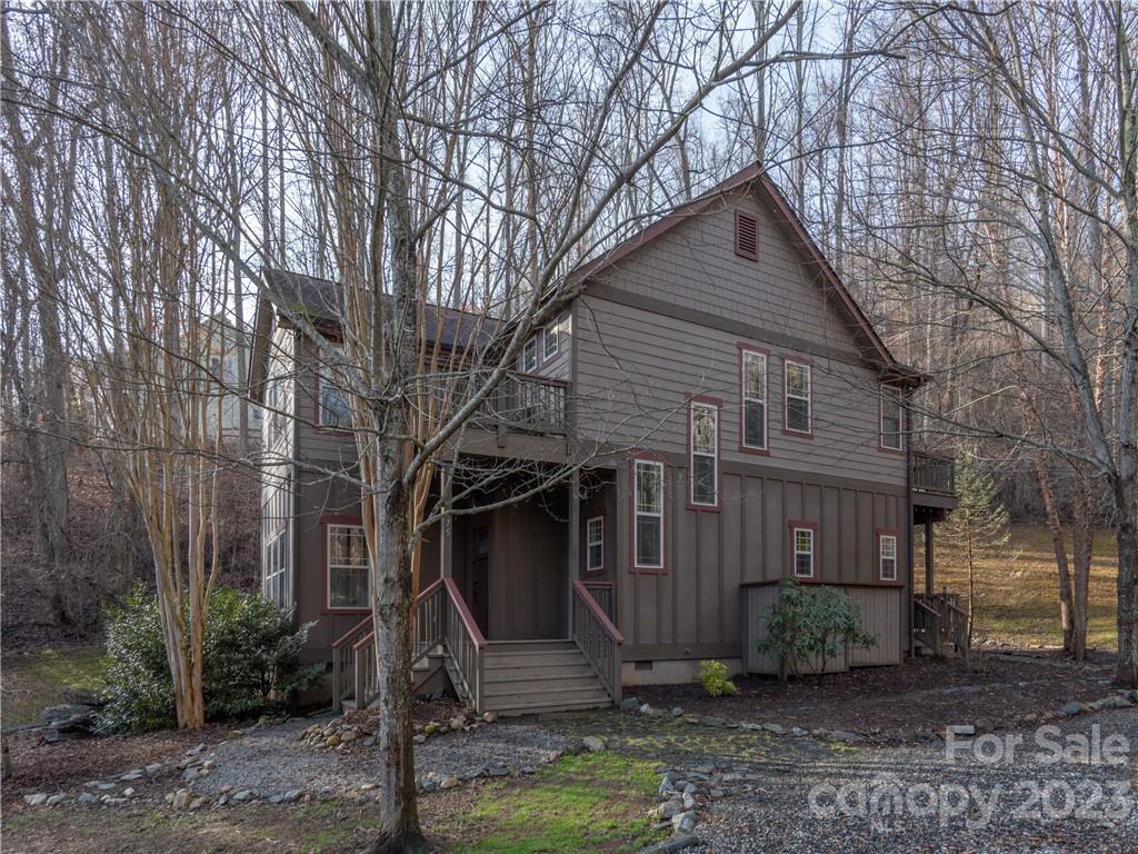 175 Red Oak Road Marshall, NC 28753 - Photo 1 of 34 a front view of a house with garden