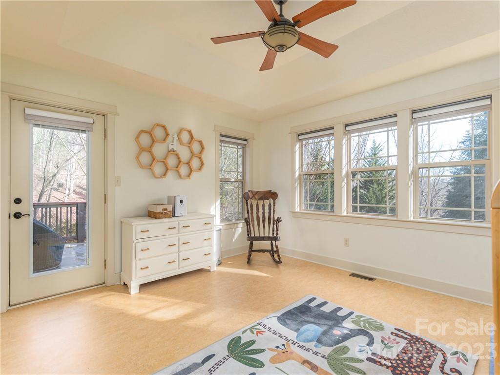 175 Red Oak Road Marshall, NC 28753 - Photo 21 of 34 a bedroom with a bed and a window