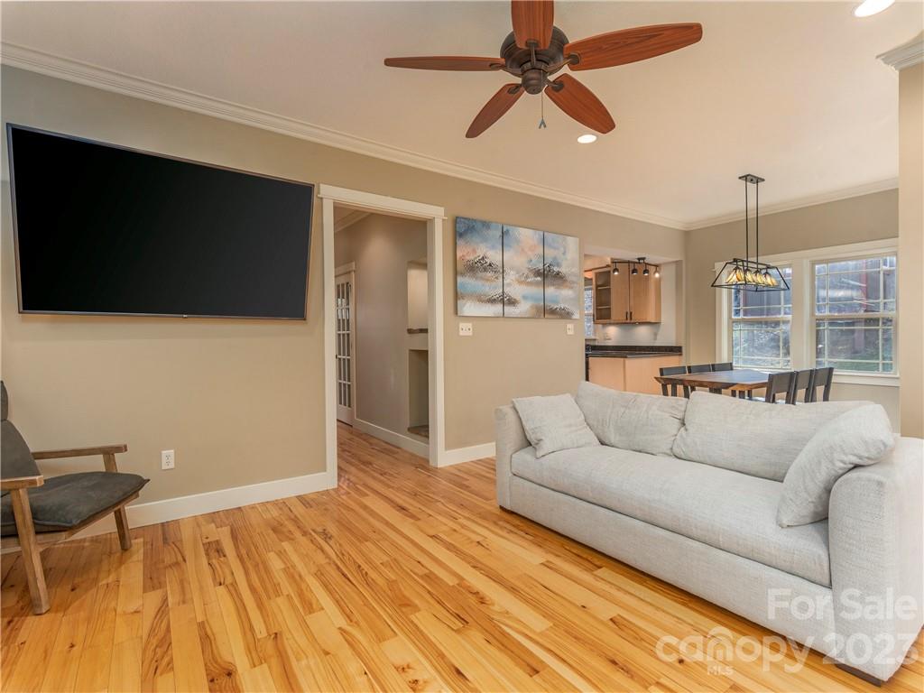 175 Red Oak Road Marshall, NC 28753 - Photo 5 of 34 a living room with furniture and a flat screen tv