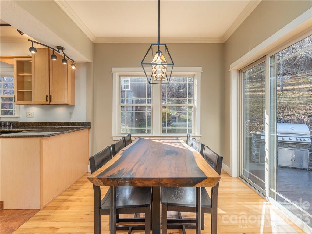 175 Red Oak Road Marshall, NC 28753 - Photo 6 of 34 a view of a dining room with furniture window and outside view