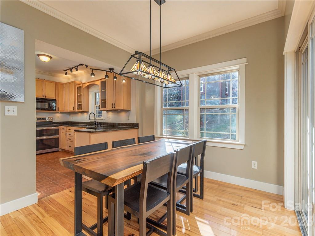 175 Red Oak Road Marshall, NC 28753 - Photo 7 of 34 a kitchen with stainless steel appliances granite countertop a kitchen island hardwood floor and a sink