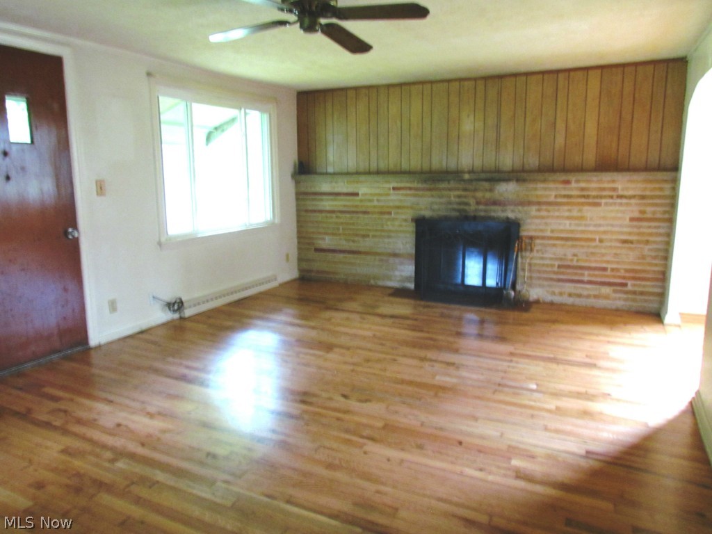 16339 Snow Road Burton, OH 44021 - Photo 5 of 16 Living room with view of fireplace
