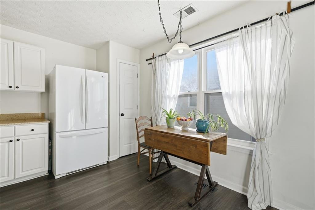 3295 Dundee Ridge Way Duluth, GA 30096 - Photo 12 of 34 a very nice looking room with a large window and wooden floor