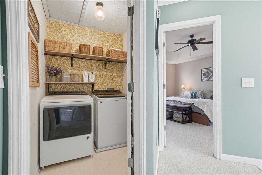 3295 Dundee Ridge Way Duluth, GA 30096 - Photo 21 of 34 a en suite bathroom with a toilet sink and mirror