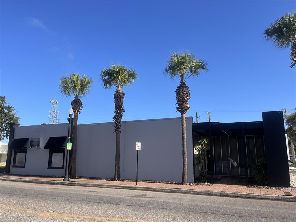 141 West Central Avenue, Unit 16 Winter Haven, FL 33880 - Photo 1 of 1 a view of a house with a potted plants